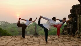 Where ancient stones witness your first sun salutation